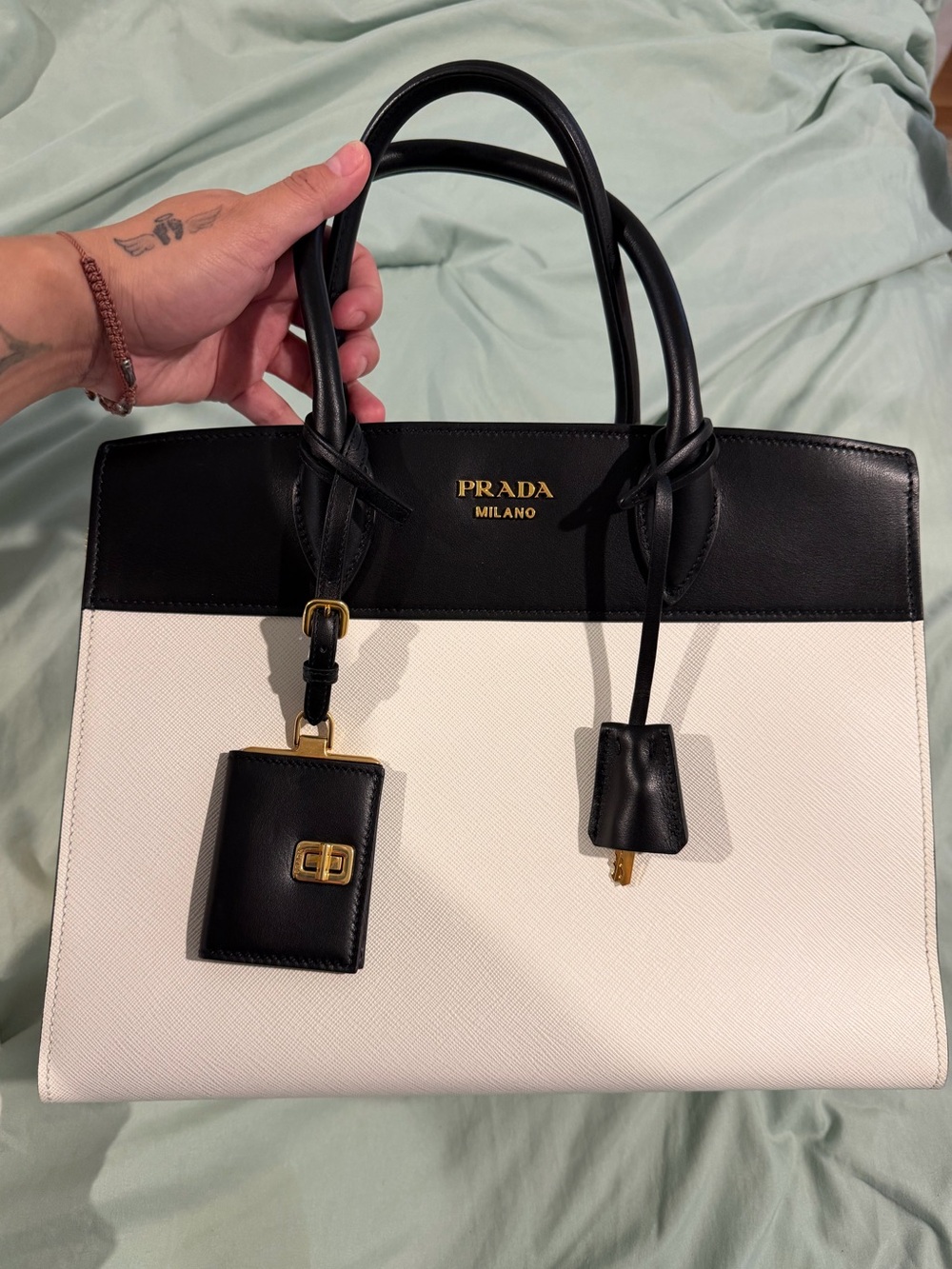 Prada Black and White Leather Women’s Handbag with Gold Hardware